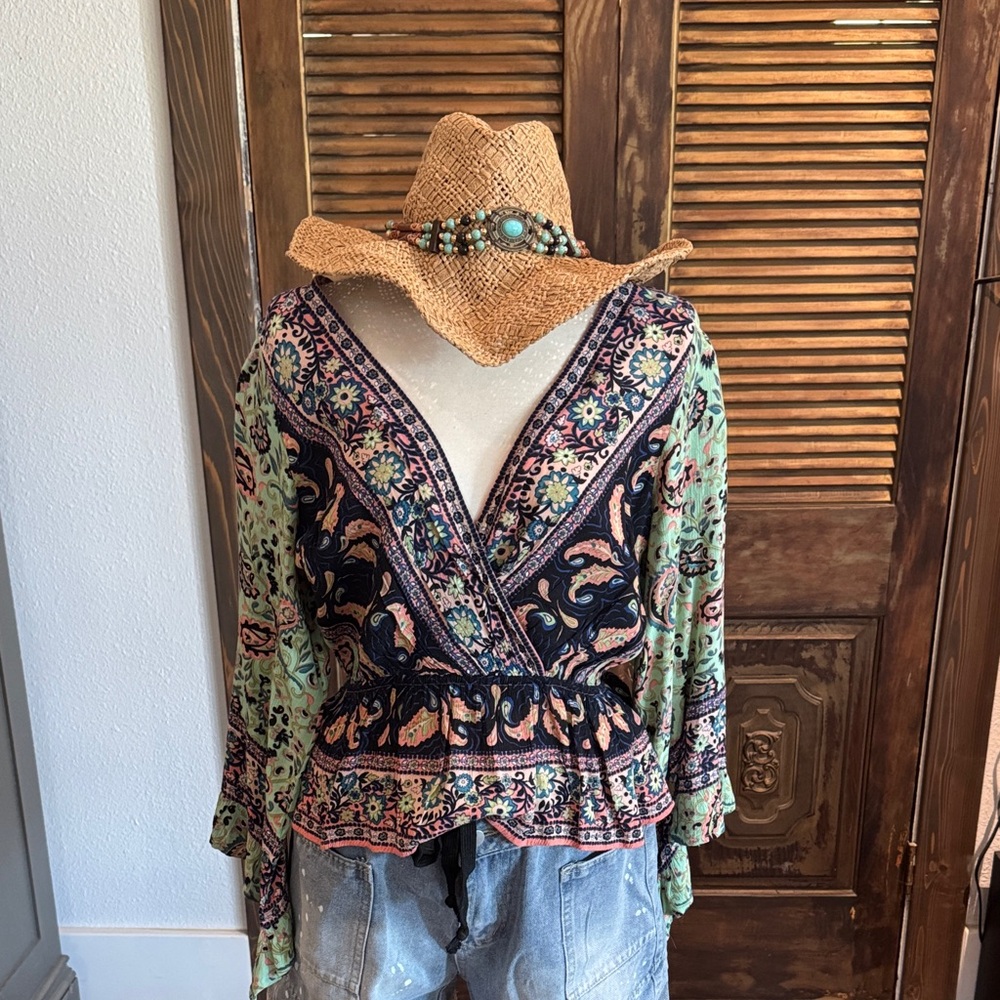 Free People Rosalie bell sleeve wrap blouse. Size M